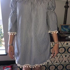 Checkered dress with Pom-poms